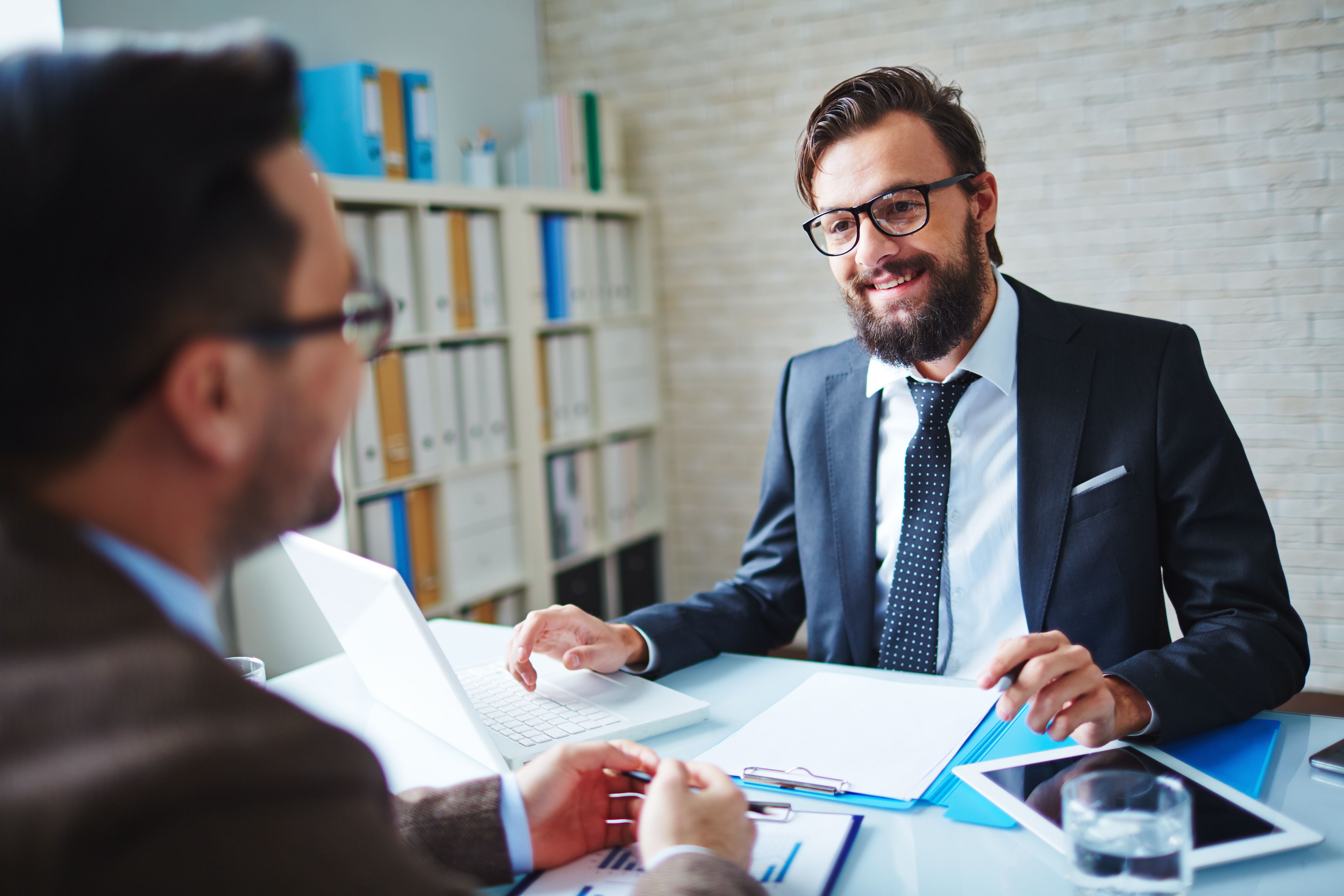 Businessman Talking To Interviewee