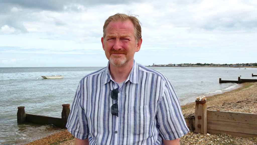 Wesley Baker Being Interviewed on the Beach